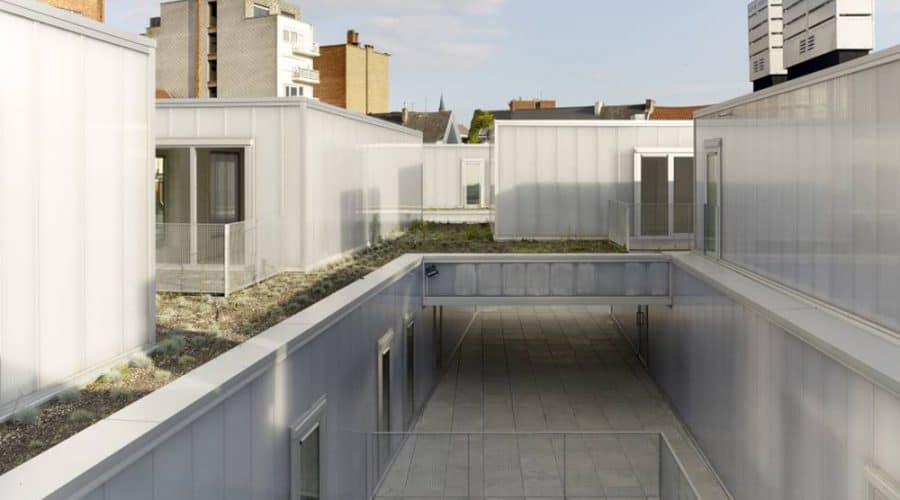 Mechelen Appartementencomplex BUSO gevelbekleding panelen met ramen woonhuizen